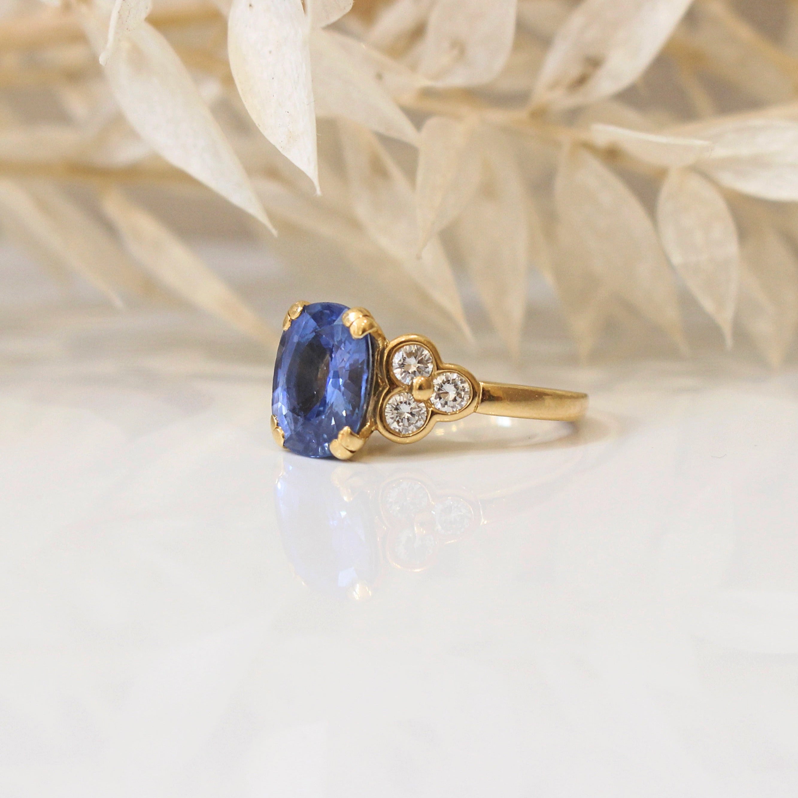 Bague or jaune best sale diamant et saphir bleu